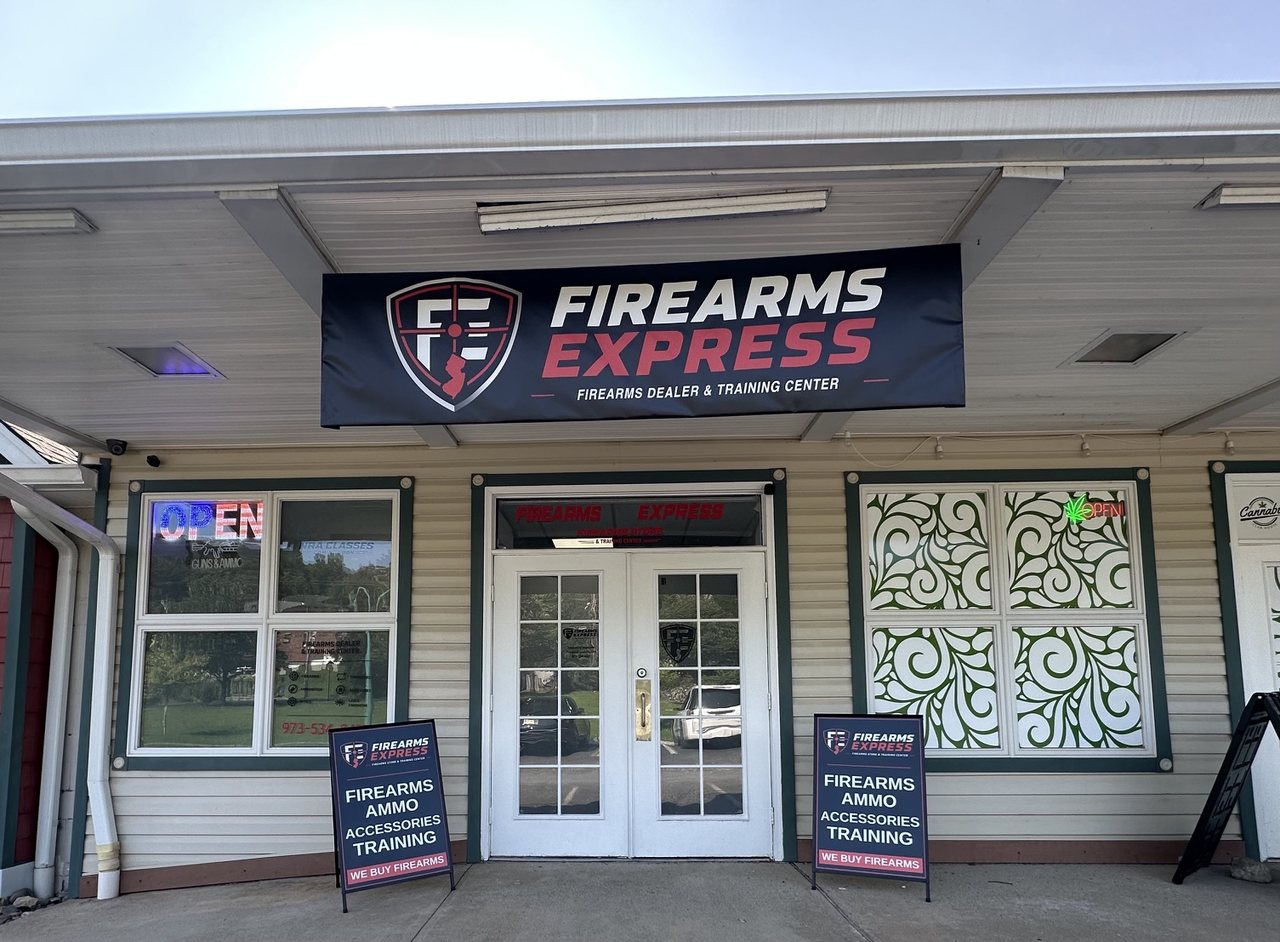 Firearms Express storefront and banner at 70 East Main Street Suite B1, Sussex NJ — firearms dealer and training center